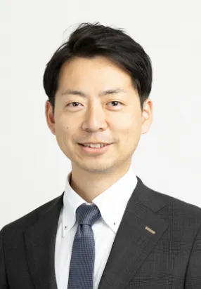 辻口 賢 氏